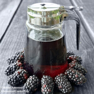 This photo shows the completed recipe for Blackberry Syrup by Reese Amorosi for GlamorosiCooks.com